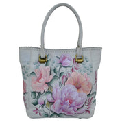 Anuschka style 609, handpainted Tall Tote With Double Handle. Bel Fiori Painted in Grey Color. Featuring one open wall pocket, and two multipurpose pockets with removable fabric cosmetic pouch and optical case.